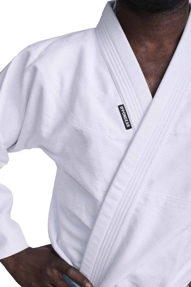 IPPONGEAR BJJ GI Brazilian Jiu Jitsu Kinder/Einsteiger Anzug inkl weißem Gürtel [Größe M2 I 350gr/m² Stoffdichte I Reißfestes Material mit versiegelten Nähten] weiß, BJJI350W-M2
