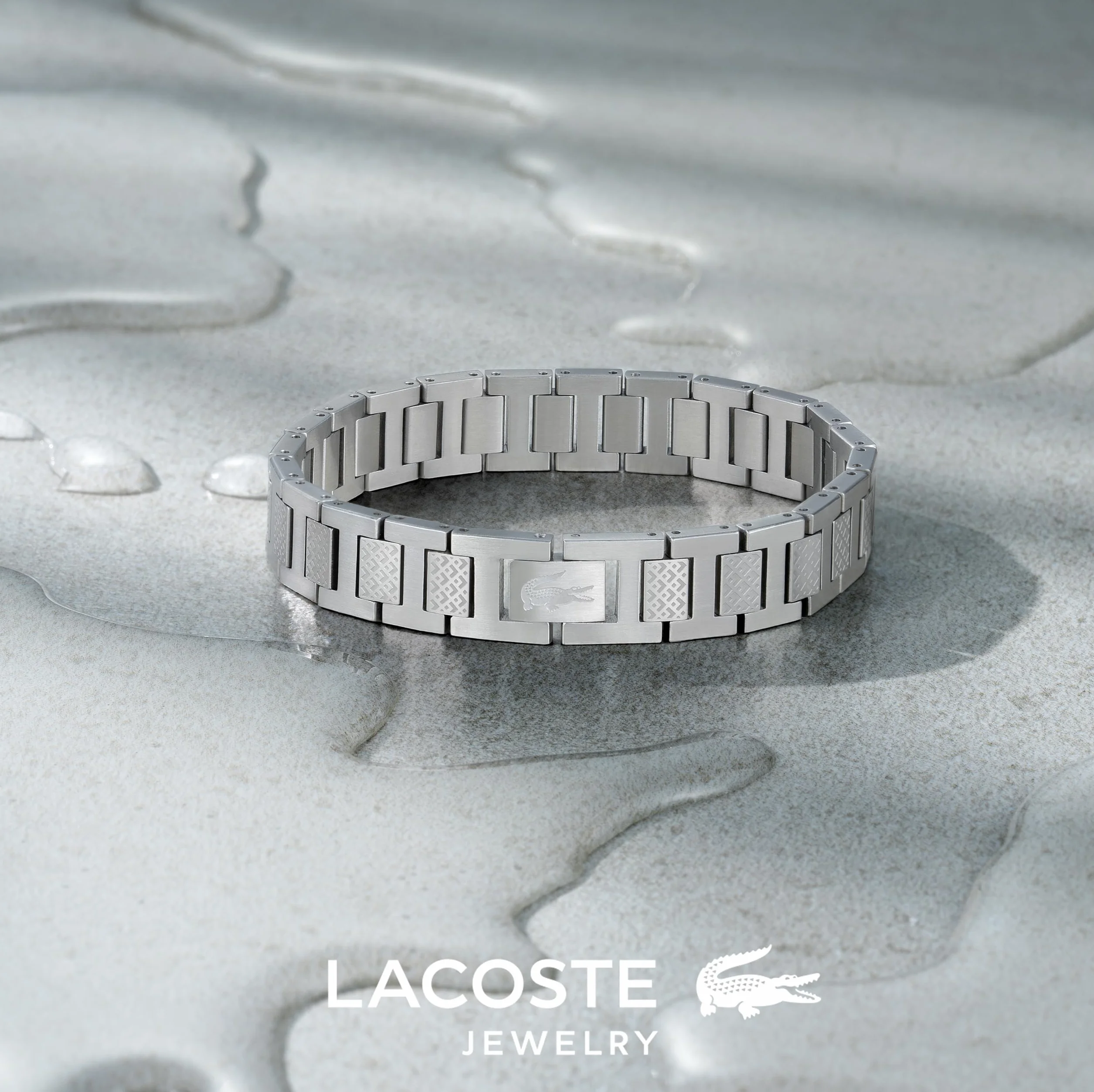 Lacoste Armband mit Knebelverschluss Kollektion METROPOLE Verziert mit petit piqué Muster - Erhältlich für ihn und sie